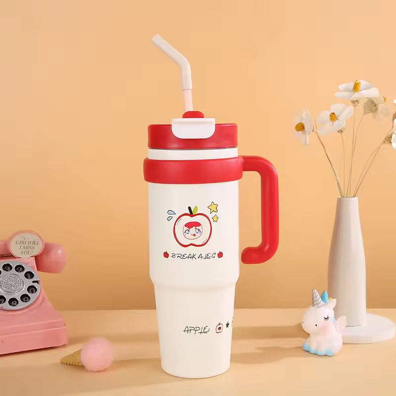 1000ml Stainless Steel Insulated TumblerTumblersCRAFTY CUDDLEWhite tumbler with red lid and handle, featuring cartoon characters, on a beige background.RedInsulatedTumbler StainlessSteelMug TravelTumbler 1000mlBottle VacuumFlask HotAndColdBottle BPAFree CoffeeOnTheGo CarCupHolderFriendly ReusableDrinkware