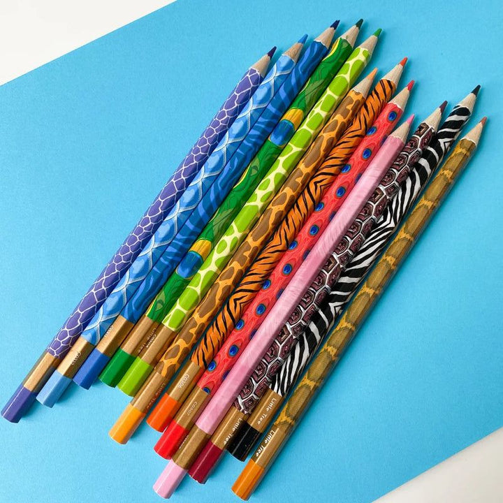 18 Shade Colour Pencil Set with Fun Animal Printspencil colorsCRAFTY CUDDLEColorful patterned pencils on a blue backgroundtopstationery premiumstationery stationeryfinds trendingshop giftideasforkids classroomessentials studentessentials