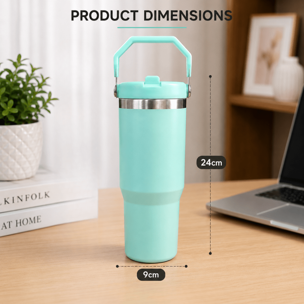 900ml Stainless Steel Insulated Tumbler with HandleInsulated Water BottleCrafty CuddleTeal tumbler with measurements on a desk with books and a laptopMint GreenStainlessSteelTumbler 900mlTumbler TravelMug StrawSipper InsulatedBottle LeakproofBottle BPAFree HydrationOnTheGo CupHolderFriendly TravelEssentialsStationeryAddict