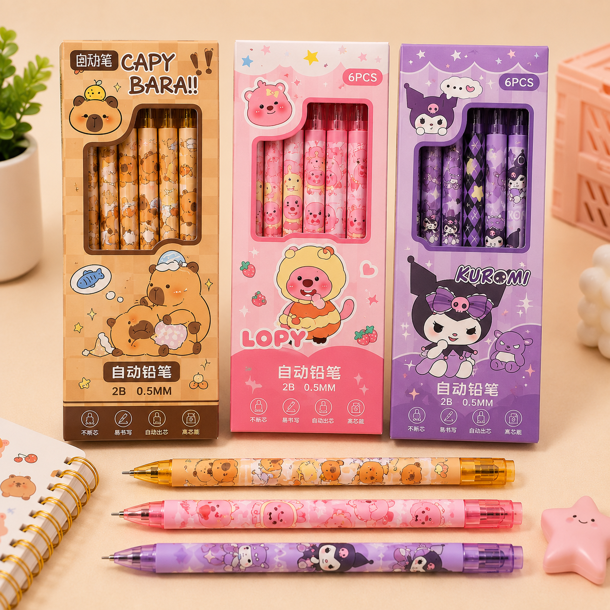 Three packages of cartoon-themed mechanical pencils displayed on a light beige surface, with three individual pens laid out in front. The packages feature Sanrio characters including Capybara, Lopopon, and Kuromi in pink, brown, and purple colorways.