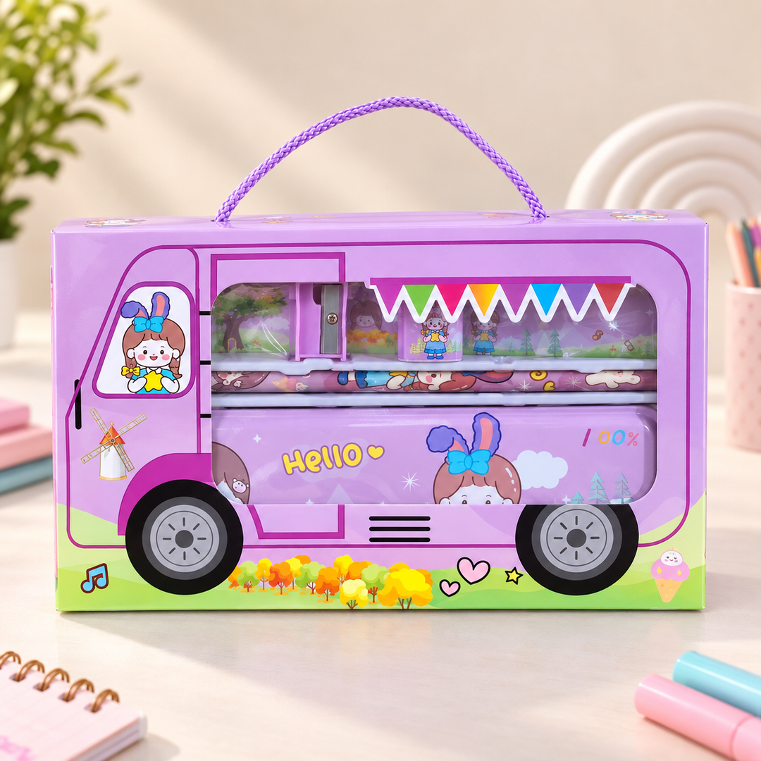 A pink and purple cartoon bus-shaped gift box with a purple handle, shown on a light tabletop. The box has a transparent side window revealing colorful items inside, with bunny and flower illustrations and the word "HELLO" printed on the front.