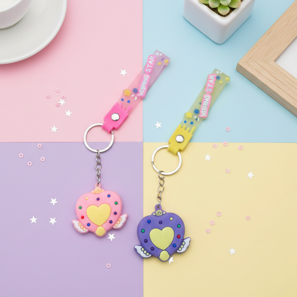 Two colorful keychains on a pastel background