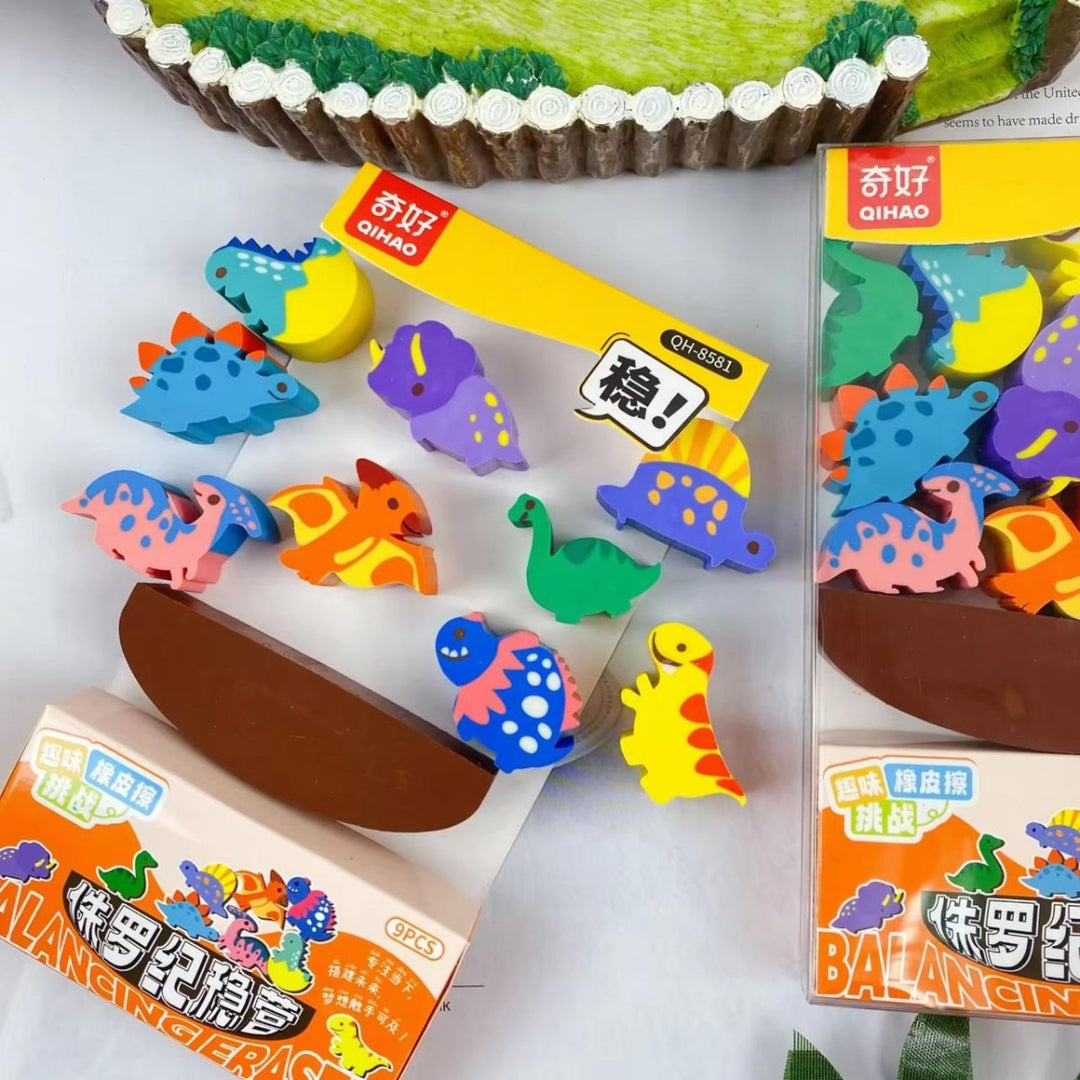 Colorful dinosaur-shaped erasers with packaging on a white background