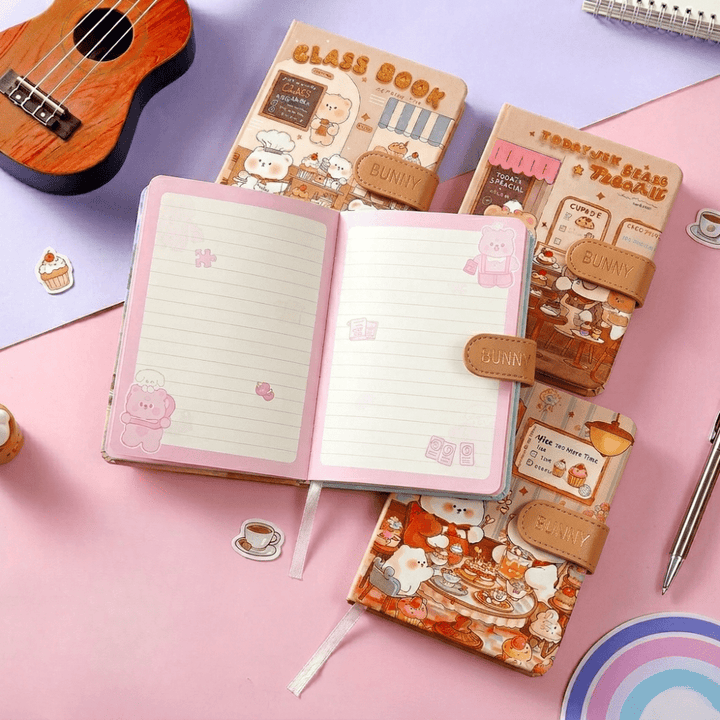 Bear Theme Diary with Magnetic ClosureDiaryCrafty CuddleNotebook with cute design on a pink surface, surrounded by stationery items.CuteDiary BearTheme KawaiiStationery AestheticNotebook CartoonDiary JournalLovers CuteStationery SchoolSupplies PastelAesthetic StationeryAddict