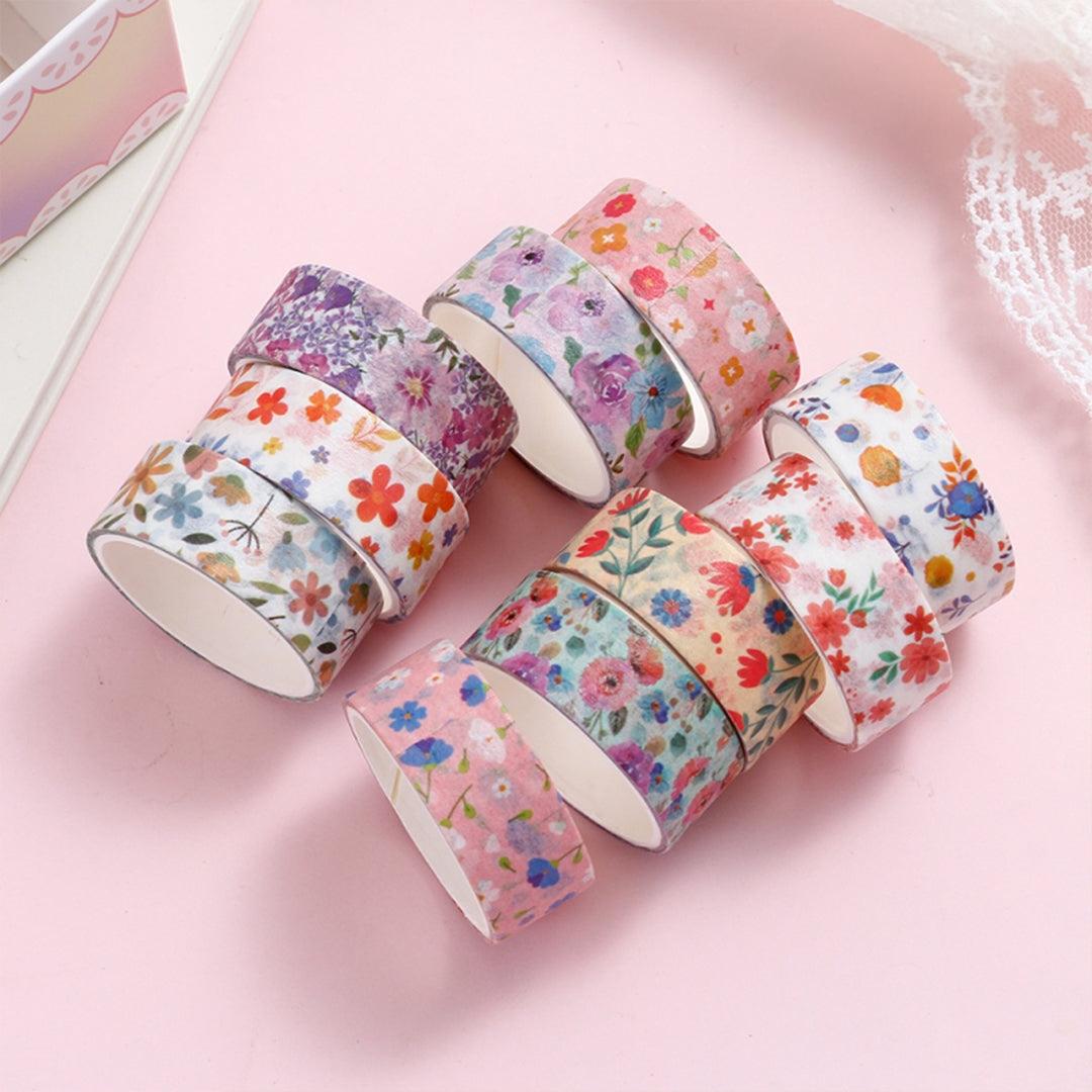 Blooming floral washi tape rolls neatly arranged in a Beautiful Pink Plate