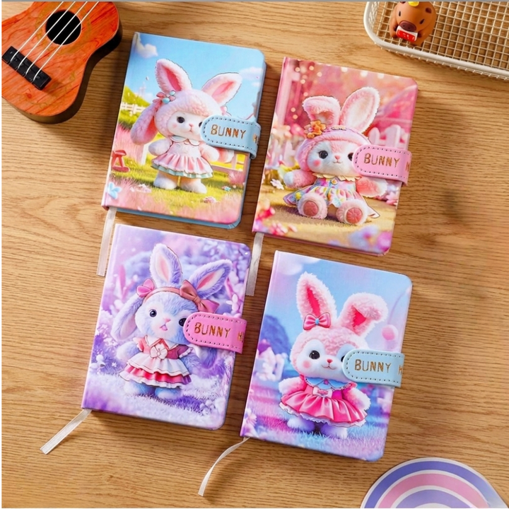 Bunny Theme Diary with Magnetic ClosureDiaryCrafty CuddleFour colorful rabbit - themed notebooks on a wooden surface with a small ukulele and basket in the background.CuteDiary KawaiiStationery BunnyNotebook AestheticStationery CuteNotebook JournalLovers StationeryAddict KawaiiDiary SchoolSupplies PastelStationeryStationeryAddict