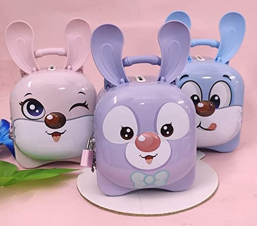 Three cartoon-style coin banks with rabbit designs on a pink background
