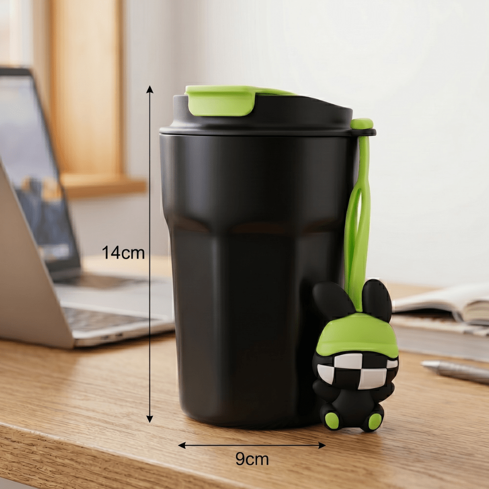Cartoon Charm Insulated Coffee TumblerInsulated Coffee TumblerCrafty CuddleBlack tumbler with green lid and character on a desk next to a laptopBlackCuteTumbler AestheticCups TrendyDrinkware PastelVibes KawaiiStyle ReusableCup HydrationGoals CuteAccessories GiftIdeas HomeEssentials