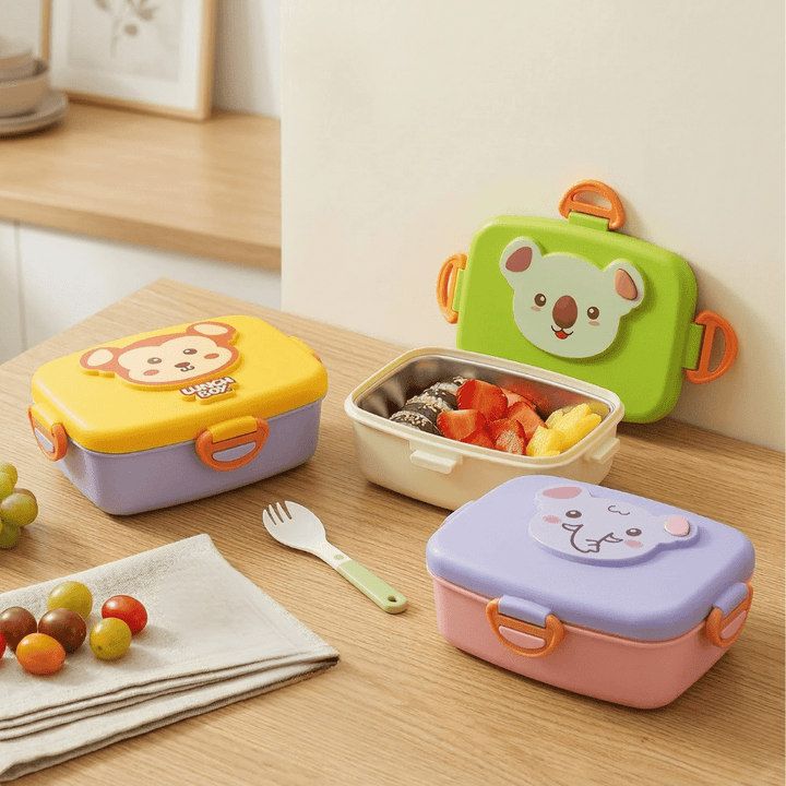 Cartoon Stainless Steel Lunch BoxStainless Steel Lunch BoxCrafty CuddleSet of colorful cartoon - themed lunch boxes on a wooden table with snacks.Yellowkidslunchbox schoollunchbox cartoonlunchbox kidslunch schoolessentials bentolunchbox kidsproducts lunchboxforkids backtoschool tiffinbox