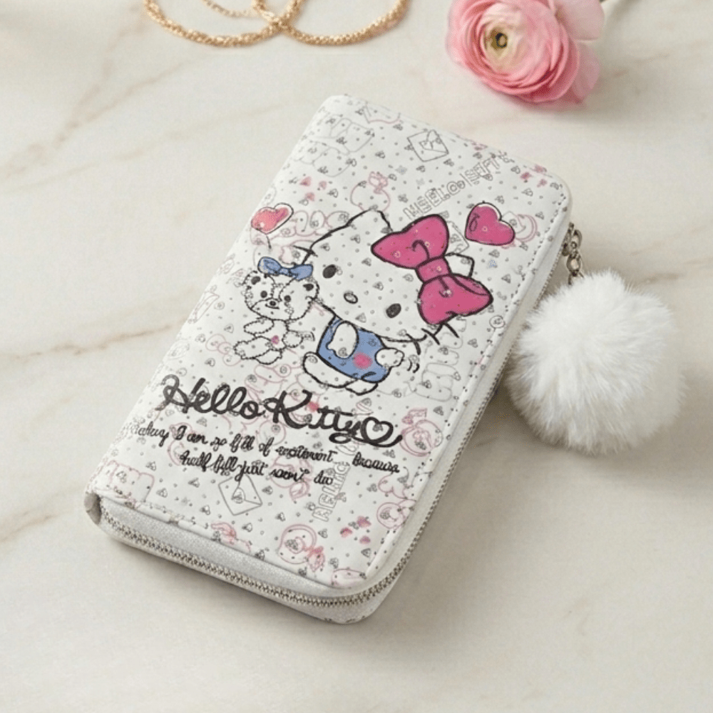 Cartoon Zipper Wallet with Pom PomPencil PouchCrafty CuddleHello Kitty wallet with decorative elements on a light backgroundHello Kittycutewallet kawaiiwallet girlswallet cartoonwallet cuteaccessories kawaiistyle girlsfashionaccessories trendingwallet giftforgirls cutekawaii