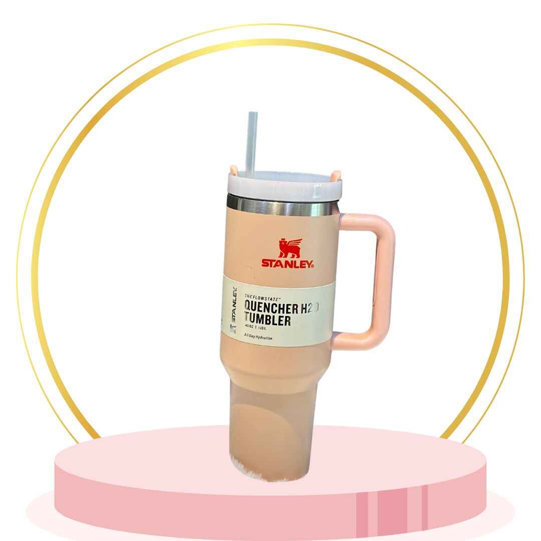 Powder-coat white 16 oz Stanley tumbler, vacuum-insulated with twist-lock lid and non-slip base.