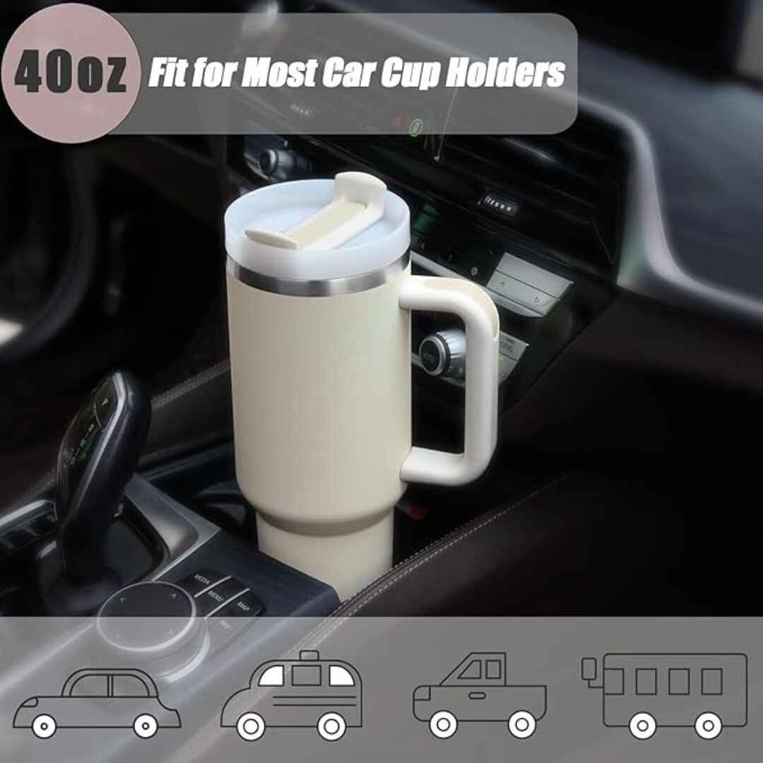 Stainless steel Stanley travel tumbler, 22 oz, insulated, spill-resistant slider lid, sleek cylindrical shape.