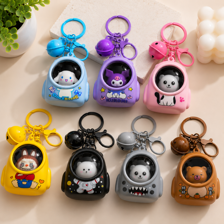 Cute Cartoon LED Keychain with BellKeychainsCrafty CuddleEight astronaut-shaped keychains in different colors are arranged on a light beige surface. Each keychain has a small character face inside a clear helmet and a small bell attached to the ring.CuteKeychain CartoonKeychain BagCharm KeychainCollection KawaiiAccessories CuteAccessories GiftIdeas ReturnGifts StationeryLovers CraftyCuddleStationeryAddict