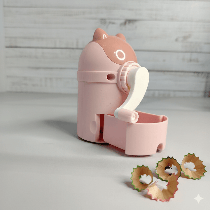 Cute Cartoon Manual Pencil SharpenerStationery > Erasers &amp; SharpenersCRAFTY CUDDLEPink pencil sharpener with two sharpened pencil tips on a light gray backgroundBlueKidsStationery CuteStationery KawaiiStationery SchoolSupplies StationeryAddict CartoonStationery BackToSchool StudyEssentials PastelStationery StationeryLove