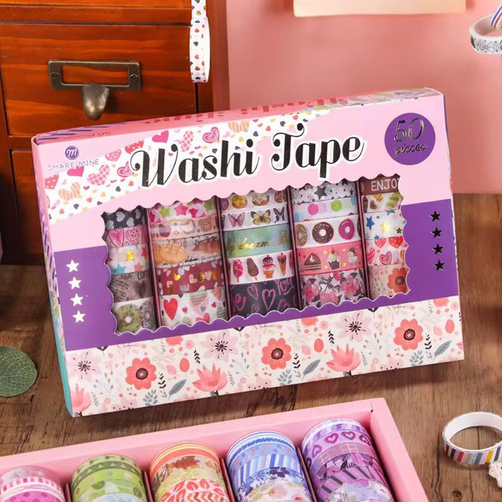 Cute Dessert &amp; Heart Theme Washi Tape Box – 50 RollsDecorative Washi TapeCRAFTY CUDDLEBox of washi tape with colorful designs on a wooden surfacewashitape washitapelove washitapecollection papercrafts diycrafts journaling bulletjournal plannerdecor creativejournaling stationerylovers aestheticstationery