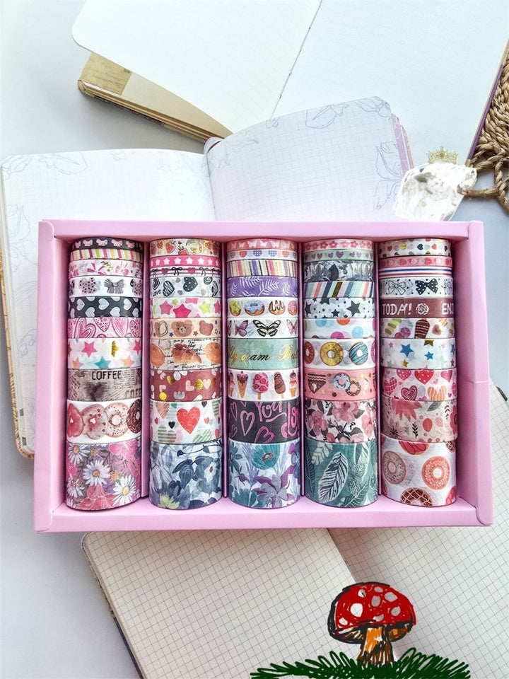 Cute Dessert &amp; Heart Theme Washi Tape Box – 50 RollsDecorative Washi TapeCRAFTY CUDDLESet of colorful washi tape rolls in a pink box on a light surface.washitape washitapelove washitapecollection papercrafts diycrafts journaling bulletjournal plannerdecor creativejournaling stationerylovers aestheticstationery