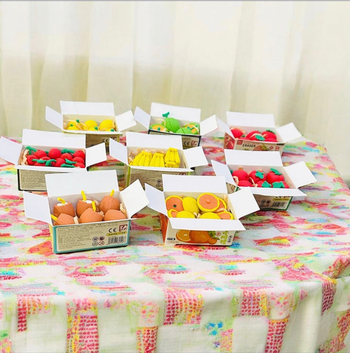 Cute Fruit Shape Eraser Set in Storage BoxErasersCRAFTY CUDDLEColorful erasers fruits and vegetables in boxes on a patterned tablecloth.1 BoxFruitErasers CuteStationery KidsStationery KawaiiStationery ReturnGiftIdeas SchoolSupplies StationeryAddict NoveltyErasers BackToSchool StationeryLovers