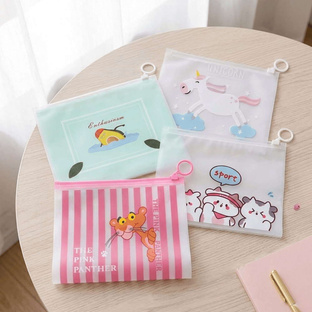 Cute Mini Cartoon Zipper PouchPencil PouchCrafty CuddleFour small pouches with cartoon designs on a round wooden table.1MiniPouch CuteStationery CartoonPouch KidsPouch CoinPouch StationeryLovers CuteAccessories KidsStationery SmallOrganizer KawaiiStationery