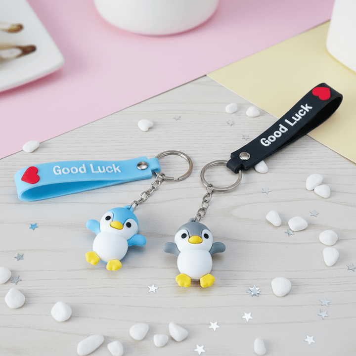 Cute Penguin KeychainKeychainsCRAFTY CUDDLETwo penguin keychains with &