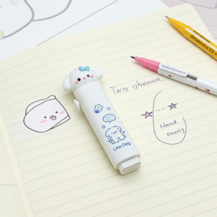 Cute Push - Pull Cartoon Erasers for KidsCRAFTY CUDDLEDog theme push pull eraser on a notebook page with drawingsDog