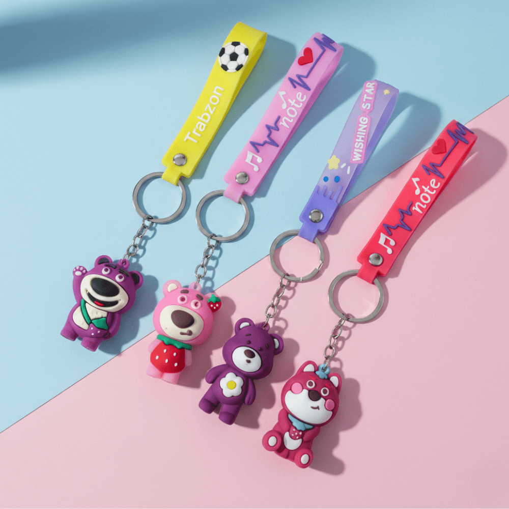 Cute Teddy Bear Silicone KeychainKeychainsCRAFTY CUDDLEColorful keychains with bear figures on a pink and blue background1TeddyBearKeychain CuteKeychain CartoonKeyring KawaiiAccessories GirlsBagCharm BackpackCharm SiliconeKeychain ReturnGifts TrendyKeychains GiftForGirls
