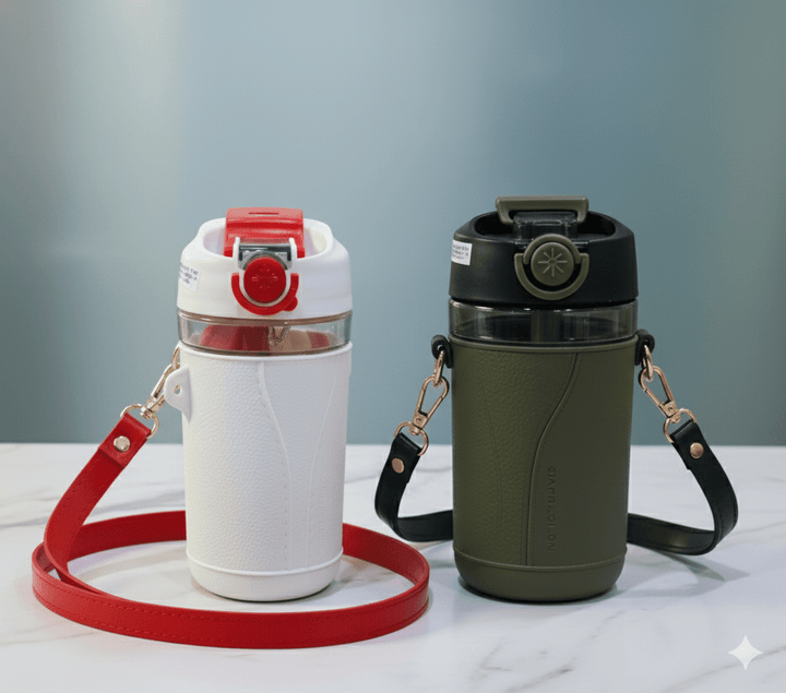 Two water bottles with straps on a light surface and gray background