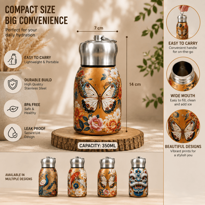 Designer Stainless Steel Water BottleLeakproof Water BottlesCrafty CuddleA compact stainless steel travel tumbler with a butterfly and floral print, shown on a wooden stand with dimensions, feature callouts, and smaller alternate color designs. The main tumbler has a warm orange-gold background with a large butterfly and pink flowers, and the image includes text highlighting portability, durability, wide mouth, BPA-free, and multiple design options.Chinese LionStainlessSteelBottle 350mlBottle De