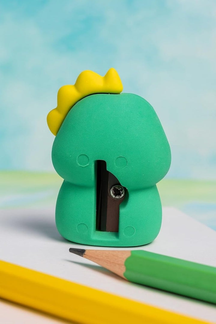 Dinosaur 2 - in - 1 Sharpener and EraserStationery > Erasers &amp; SharpenersCRAFTY CUDDLEGreen dinosaur - shaped pencil sharpener with a yellow top on a colorful background2in1stationerycollectiblestationery