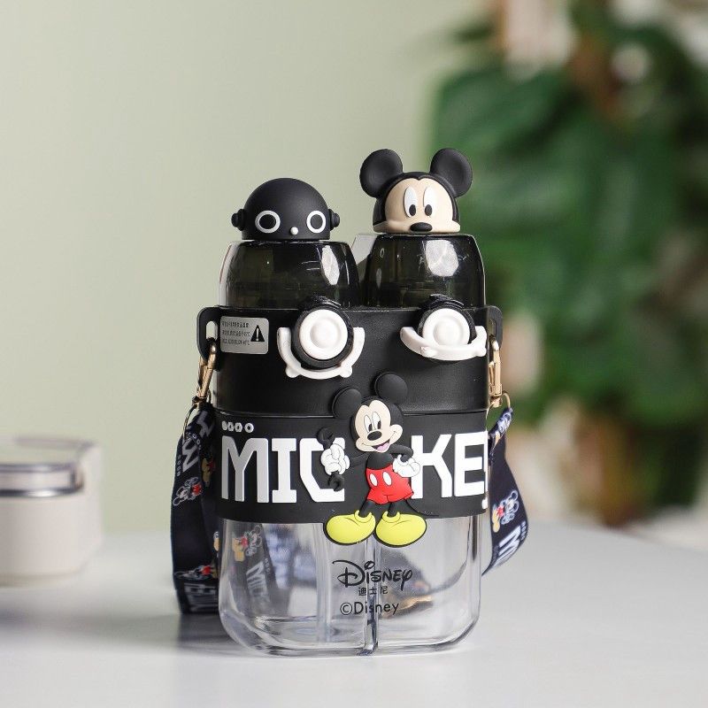 DISNEY Dual Drink Glass Water Bottle with PartitionCartoon Kids Water BottleCrafty Cuddle Mickey Mouse-themed water bottle with clear bodies and black lids on a light surface.BlackDualCompartmentBottle 780mlBottle KidsHydration WaterBottleForKids GlassSipperBottle PortableBottle SchoolBottle CuteGiftIdeas BirthdayGiftForKids DailyHydrationStationeryAddict