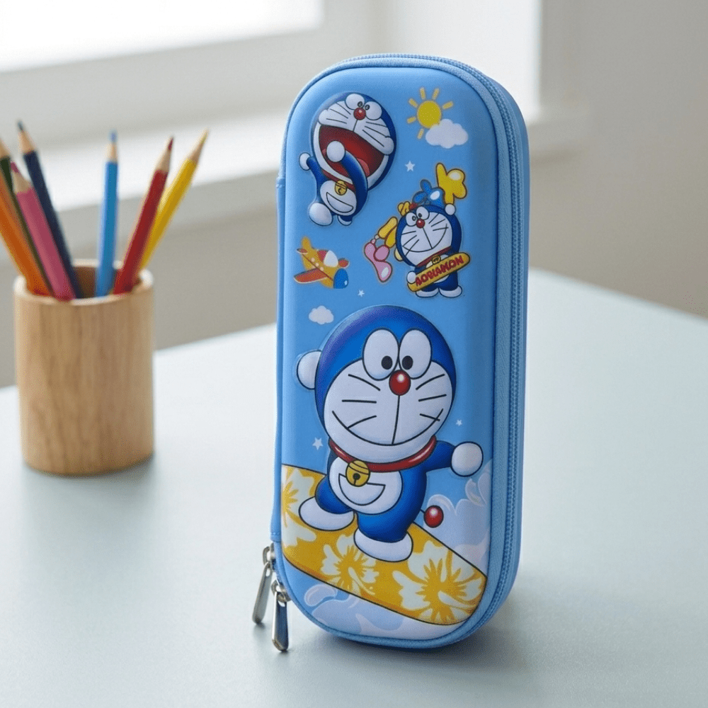 Doraemon EVA Pencil Pouch for KidsPencil PouchCrafty CuddlePencil case with cartoon character design on a table with colored pencils.CartoonPencilBox KidsStationery CuteStationery PencilCase SchoolSupplies StationeryLover EVAPencilBox BackToSchool KawaiiStationery PencilPouch