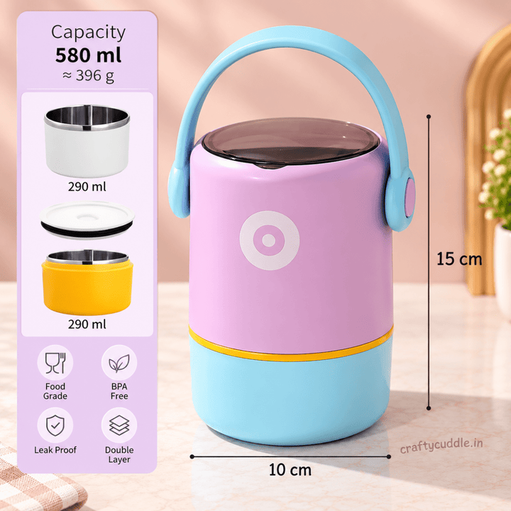 Double-Layer Insulated Lunch BoxStainless Steel Lunch BoxCrafty CuddleA pastel insulated food container with a lavender upper body, light blue base and handle, and a thin yellow band, shown on a soft beige background. The image includes dimension labels (15 cm height, 10 cm width) and a capacity panel stating 580 ml / 290 ml with icons for food grade, BPA free, leak proof, and double layer.PurpleLunchBox KidsLunchBox StainlessSteelLunchBox InsulatedLunchBox FoodContainer SchoolLunchBox LunchBoxF