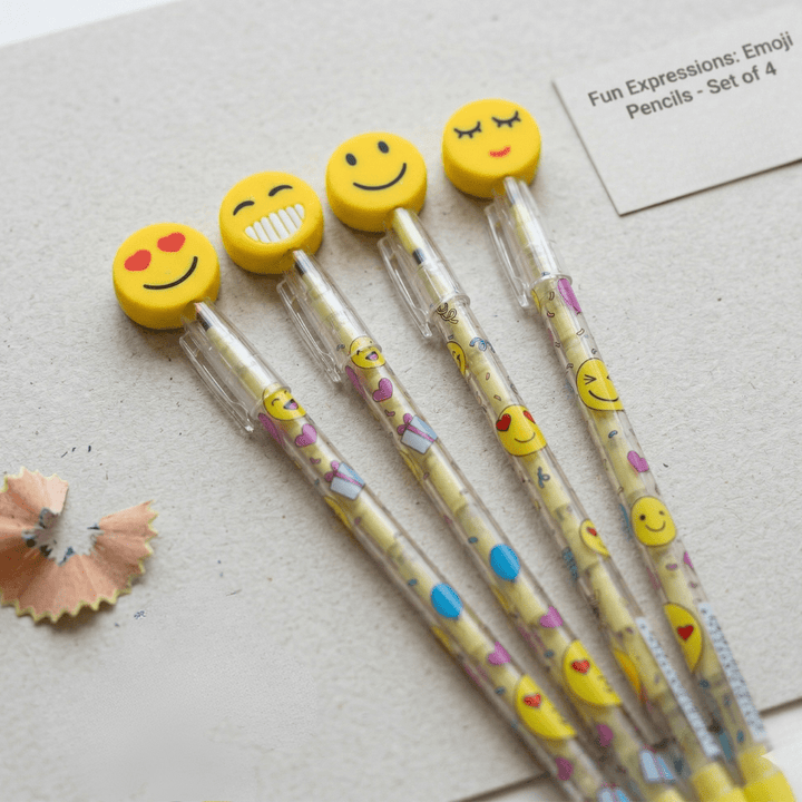 Emoji Fun Refillable PencilsCrafty CuddleSet of four emoji - themed pencils on a light background1