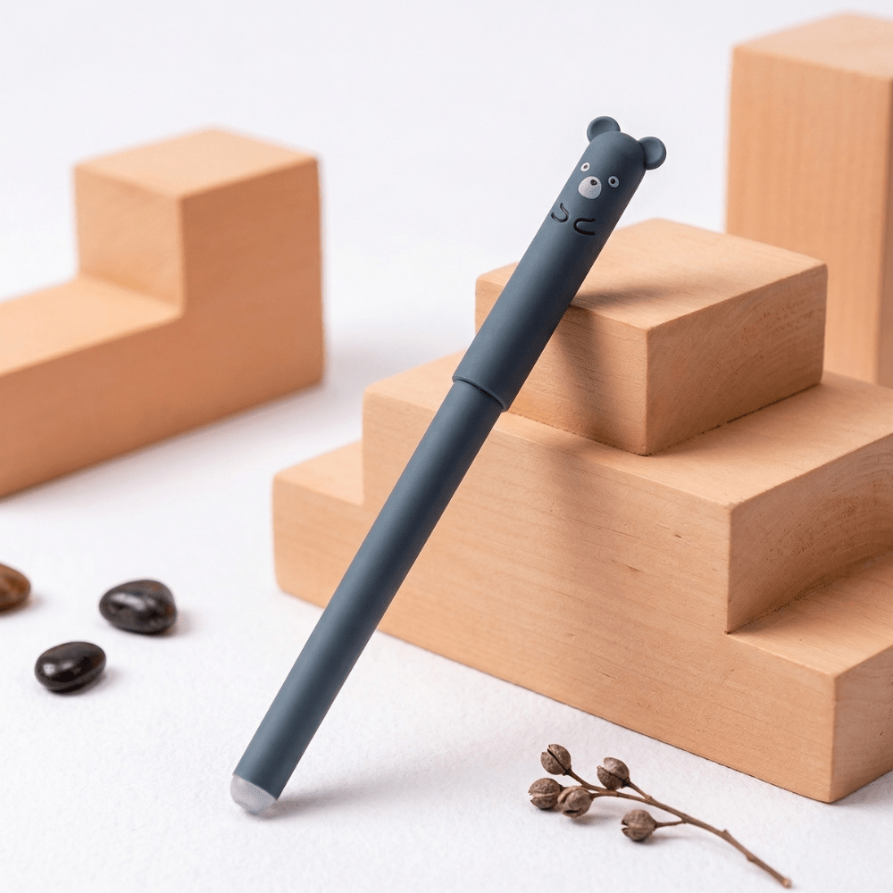 Erasable Gel Pens – 4 Cute Animal DesignsErasable Gel PensCrafty CuddleGray pen with bear - shaped top on wooden blocksBear🐻1animalpenserasablepens