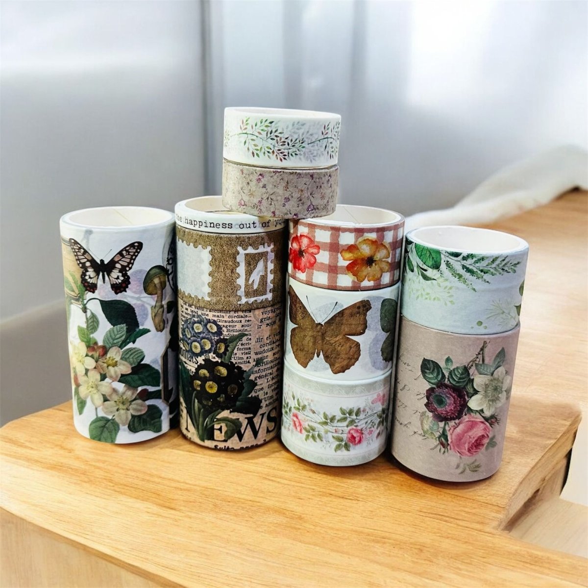 Floral Botanical Washi Tape Set - 18 RollsDecorative Washi TapeCRAFTY CUDDLEDecorative washi tapes with various patterns on a wooden surface.washitape washitapelove washitapeaddict floralstationery botanicalstationery naturestationery journaling junkjournal scrapbooking artjournaling creativejournaling aestheticstationery stationerylovers