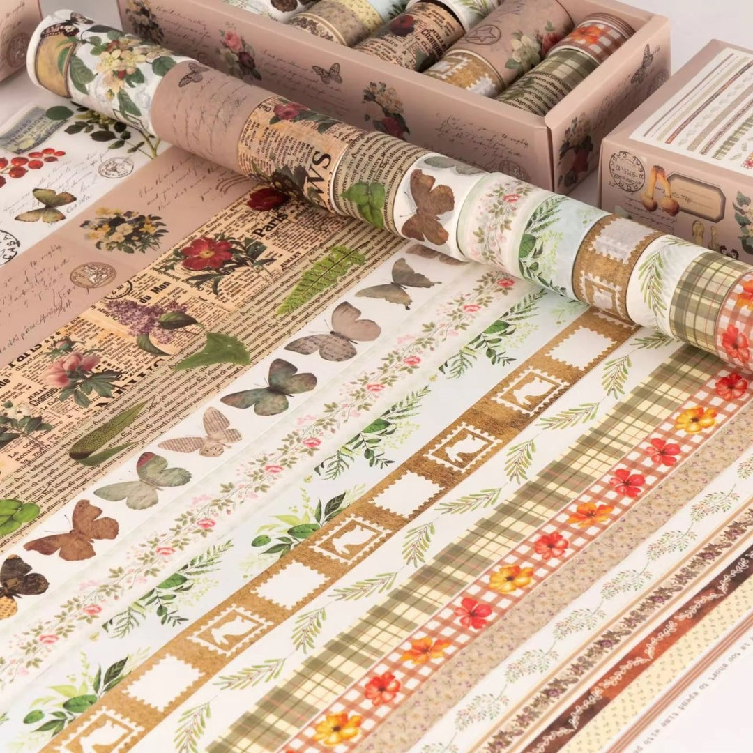 Floral Botanical Washi Tape Set - 18 RollsDecorative Washi TapeCRAFTY CUDDLECollection of decorative paper rolls with floral, butterfly, and plaid patterns.washitape washitapelove washitapeaddict floralstationery botanicalstationery naturestationery journaling junkjournal scrapbooking artjournaling creativejournaling aestheticstationery stationerylovers