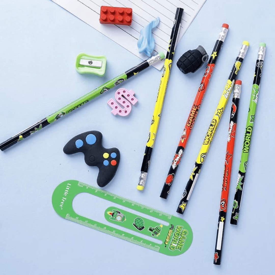 Colorful pencils and stationery items on a light blue surface