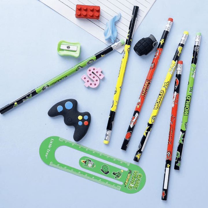 Colorful pencils and stationery items on a light blue surface