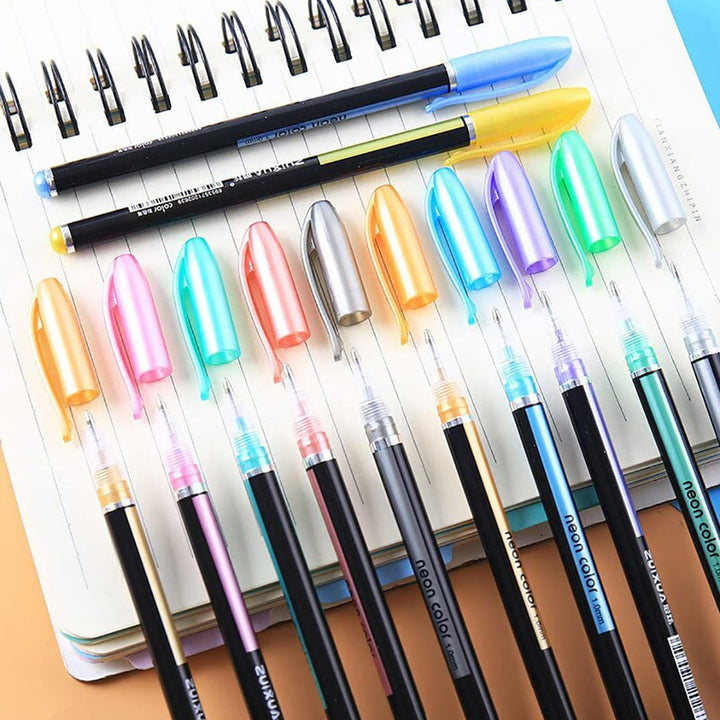 Assorted colorful gel pens on a lined notebook page