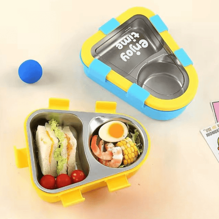 Kids 2 Compartment Lunch Box with Spoon &amp; ForkStainless Steel Lunch BoxCrafty CuddleYellow and blue bento box with compartments filled with food on a light backgroundBlueKidsLunchBox BentoBox LunchBox SchoolLunch KidsEssentials LunchBoxIdeas BackToSchool LeakproofLunchBox KidsLunch TiffinBox