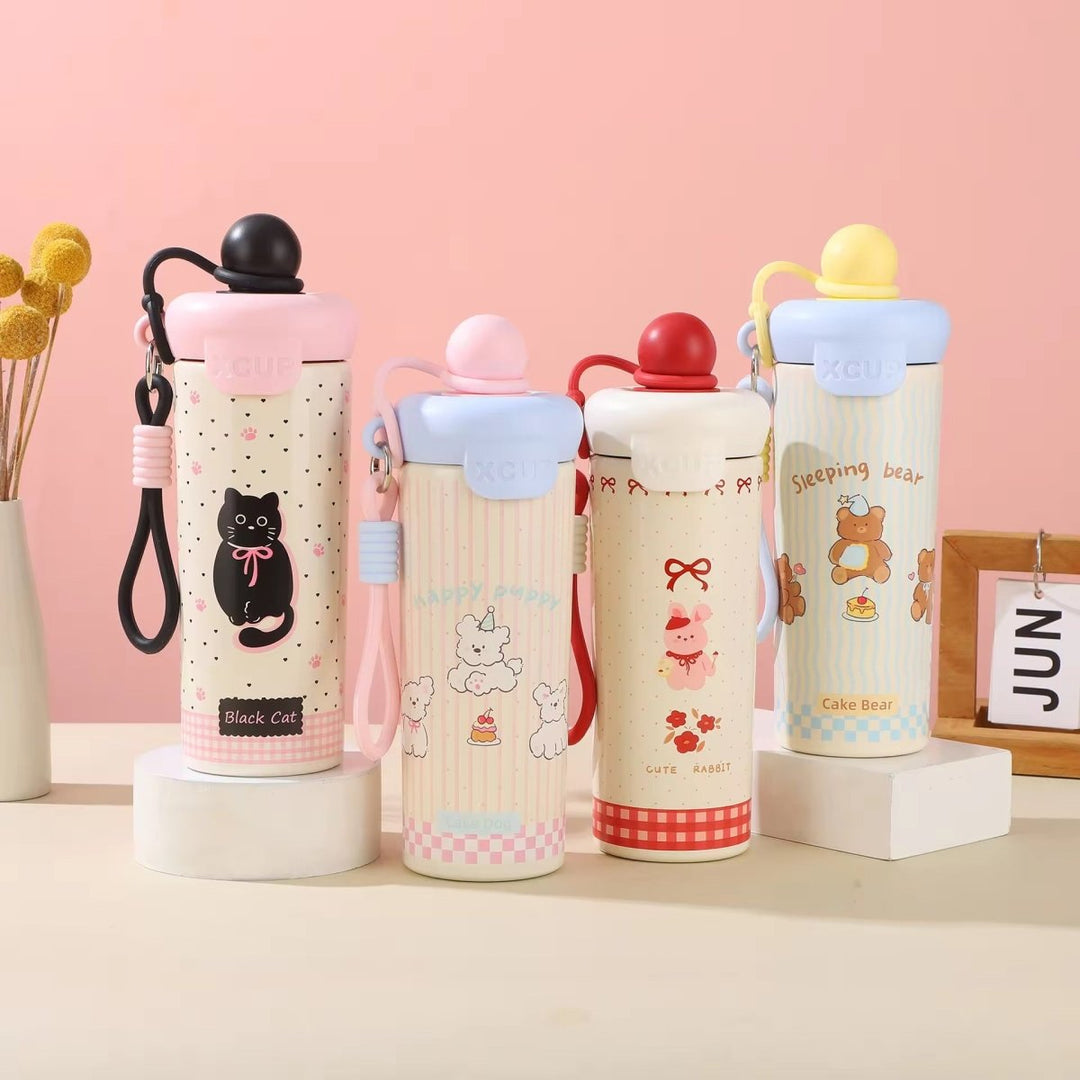 Kids Insulated Water BottleCartoon Kids Water BottleCrafty CuddleFour colorful water bottles with cartoon designs on a pink backgroundPinkStainlessSteelBottle InsulatedBottle WaterBottle KidsWaterBottle LeakproofBottle ReusableBottle SchoolEssentials TravelBottle HydrationOnTheGo CuteWaterBottle