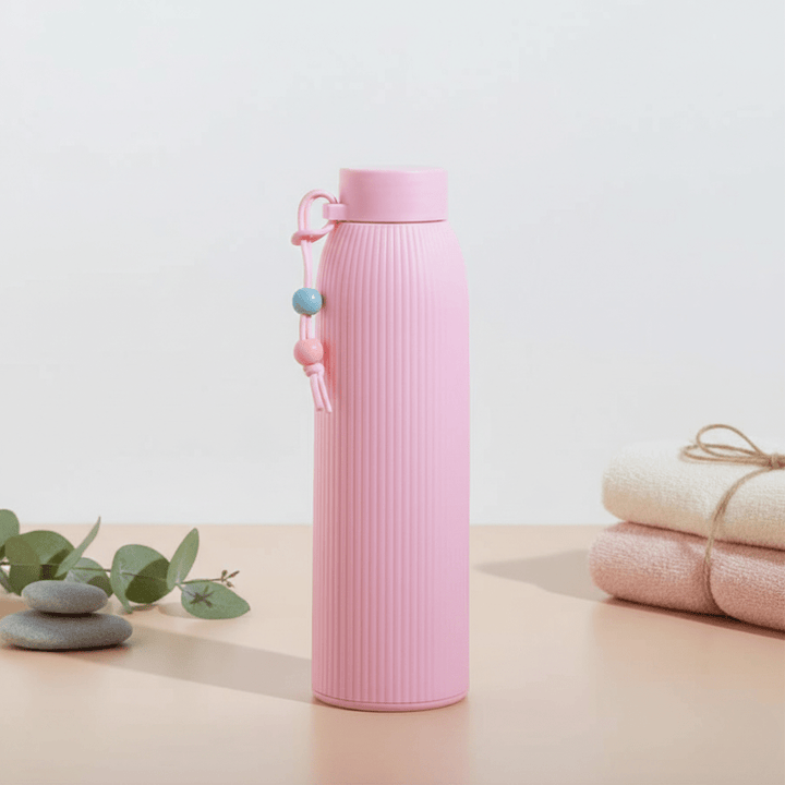 Leak Proof Mini Glass BottleCartoon Kids Water BottleCRAFTY CUDDLEPink water bottle with a decorative element on a light backgroundPink330mlBottle GlassWaterBottle MiniWaterBottle LeakProofBottle SiliconeSleeveBottle TravelWaterBottle OfficeWaterBottle ReusableBottle PastelBottle EcoFriendlyBottle