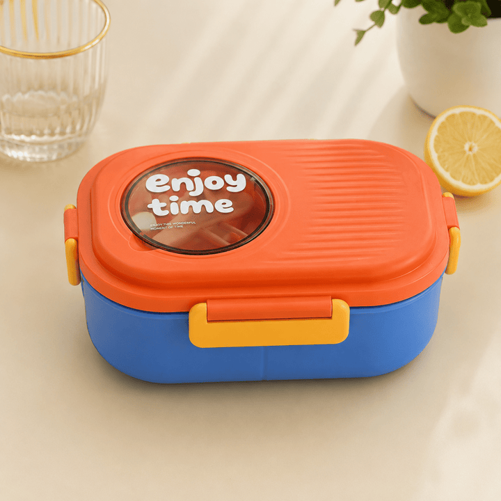 Leakproof Bento Lunch BoxStainless Steel Lunch BoxCrafty CuddleA colorful lunch box with a blue base, orange lid, and yellow accents, featuring a clear circular window on the lid with the words &