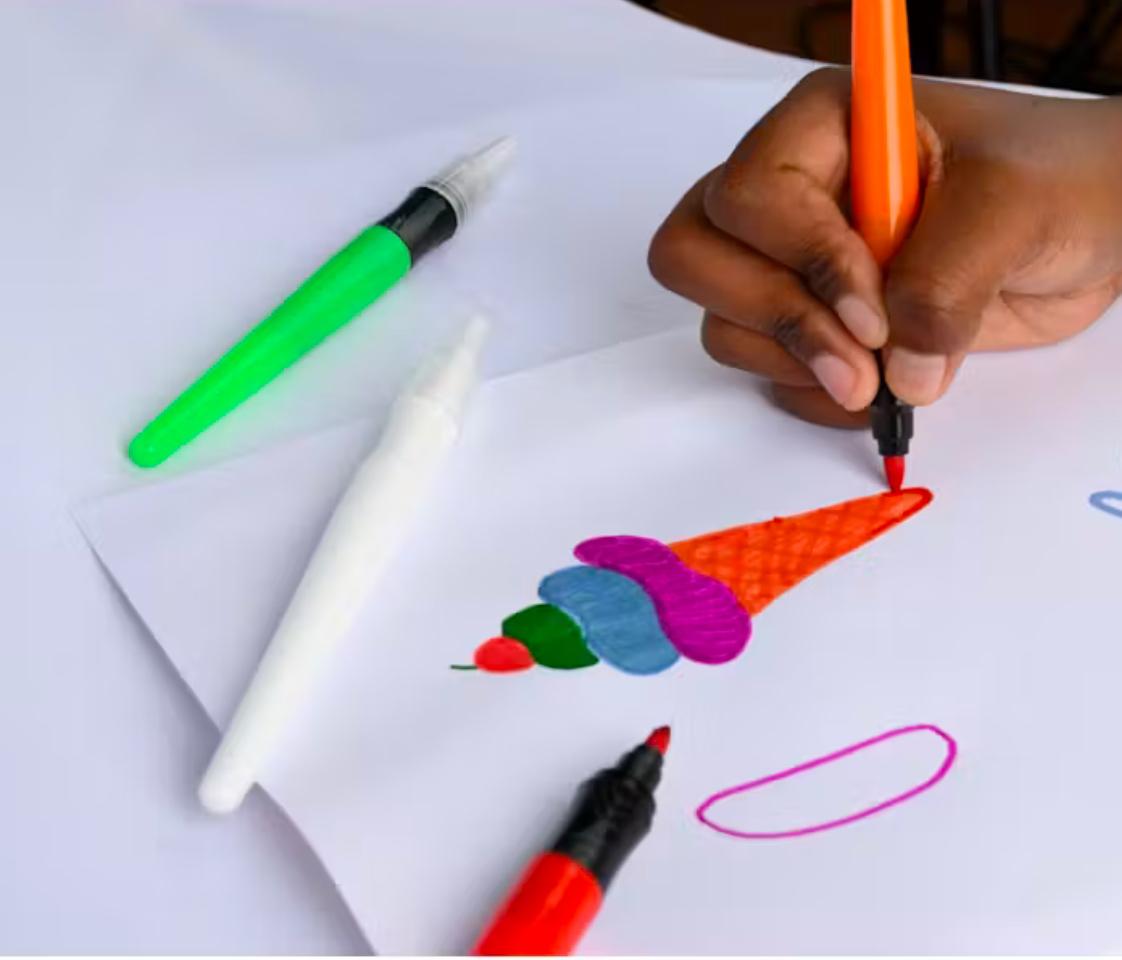 Ice cream drawing in progress using colorful markers on paper