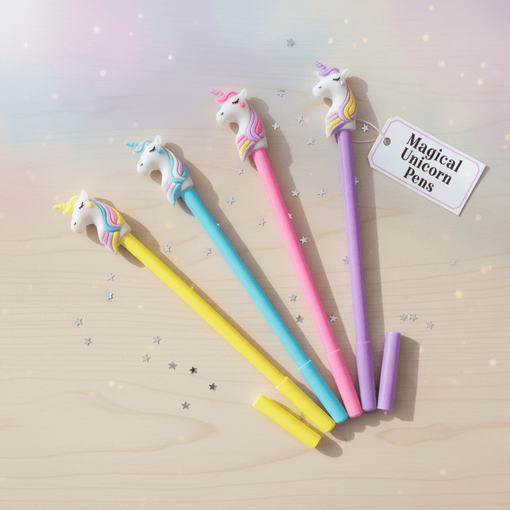 Magical Unicorn PenCrafty CuddleFour colorful pens with unicorn designs on a wooden surface, accompanied by a &