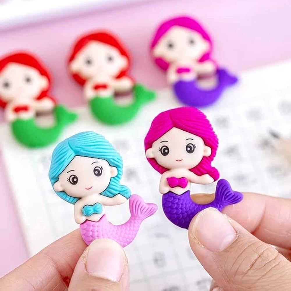 Mermaid ErasersErasersCRAFTY CUDDLEColorful mermaid figurines erasers held by a hand with a blurred background1CreativeStationeryCuteErasers