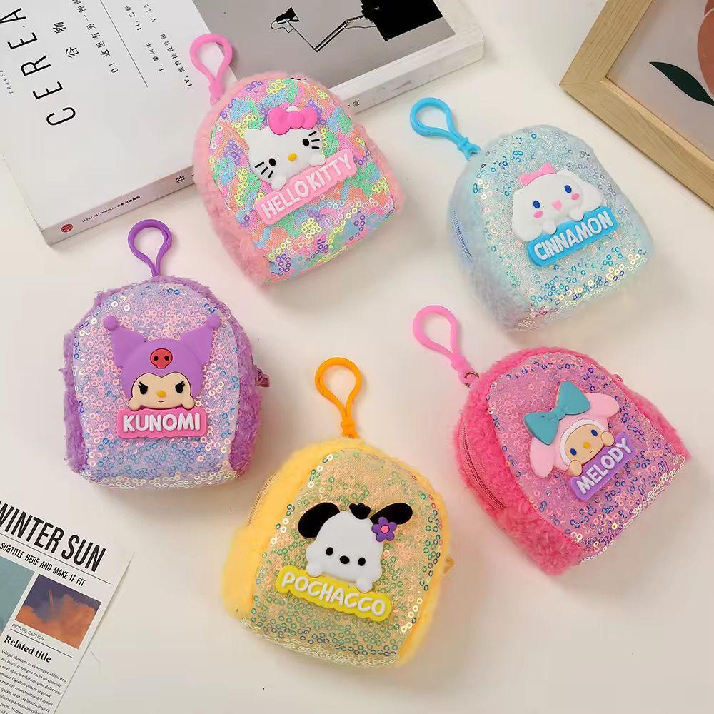Mini Sequin Coin Pouch for KidsCoin pouchCRAFTY CUDDLEFive colorful sequin pouches with cartoon characters on a white surface.PurpleSequinPouch CuteAccessories KidsAccessories CoinPouch GlitterPouch ReturnGiftIdeas KawaiiStyle MiniPouch StationeryLovers TrendyKids