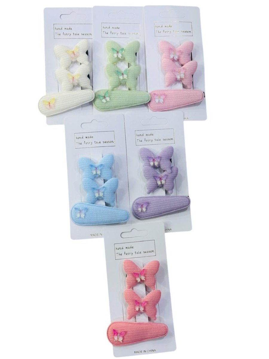Set of colorful butterfly-shaped hair clips on packaging with a white background
