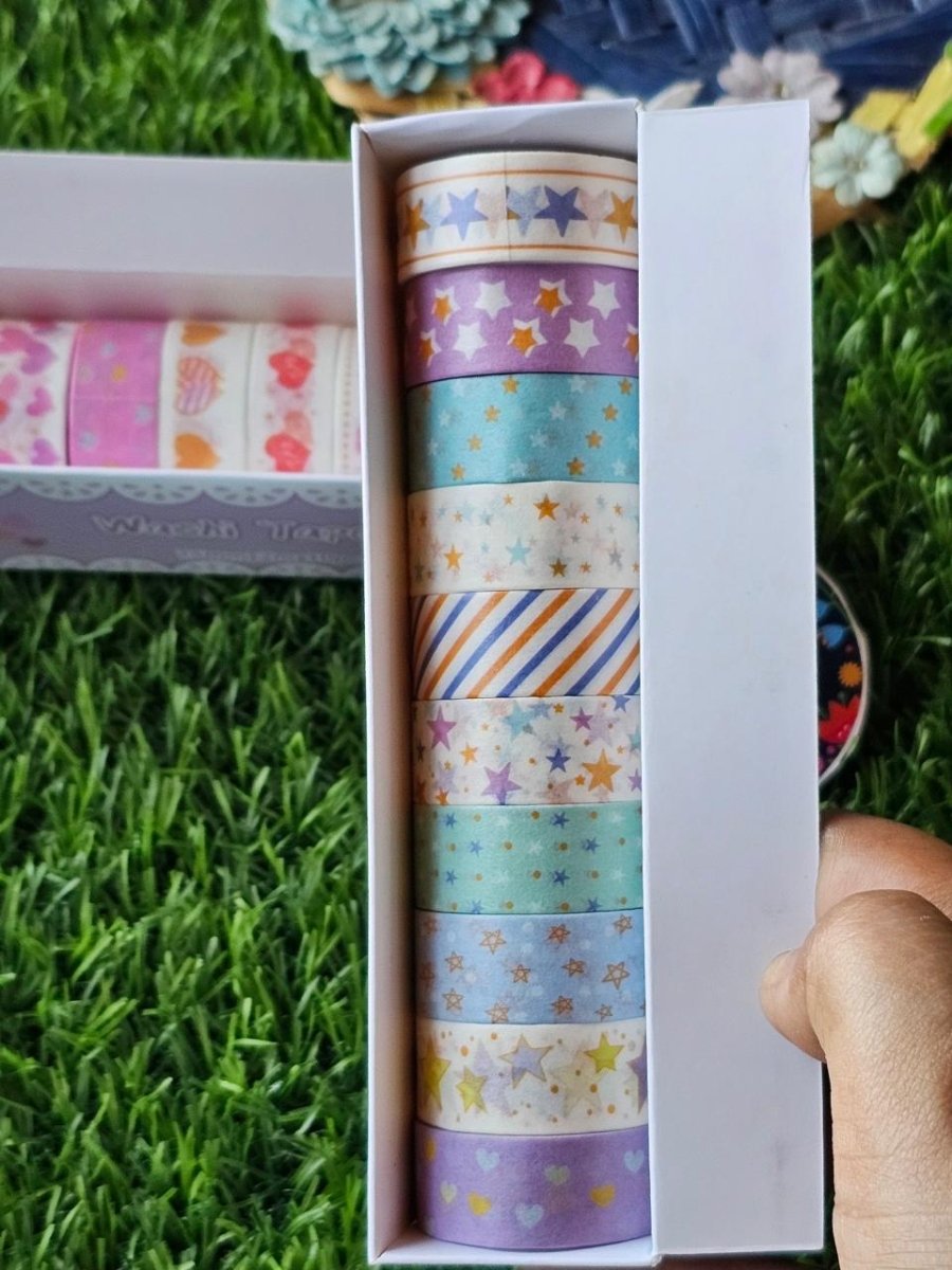 Set of decorative pastel masking tapes arranged aesthetically on a white background