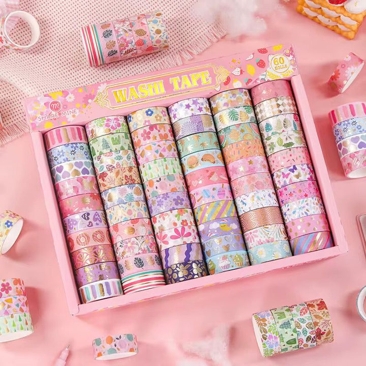 Pastel Pattern Washi Tape Mega SetDecorative Washi TapeCRAFTY CUDDLESet of colorful washi tape rolls in a decorative box on a pink backgroundart journalingbotanical tape