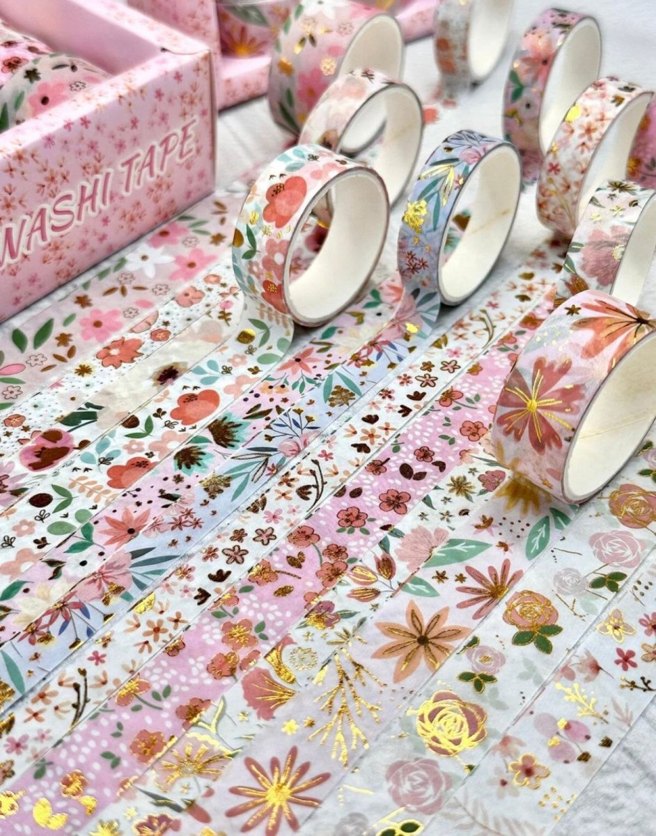 Pink Floral Washi Tape SetDecorative Washi TapeCRAFTY CUDDLEFloral - patterned washi tape rolls on a matching backgroundart journalingbotanical tape